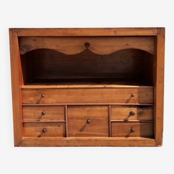 Interior of writing desk with drawers.