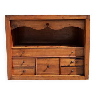 Interior of writing desk with drawers.