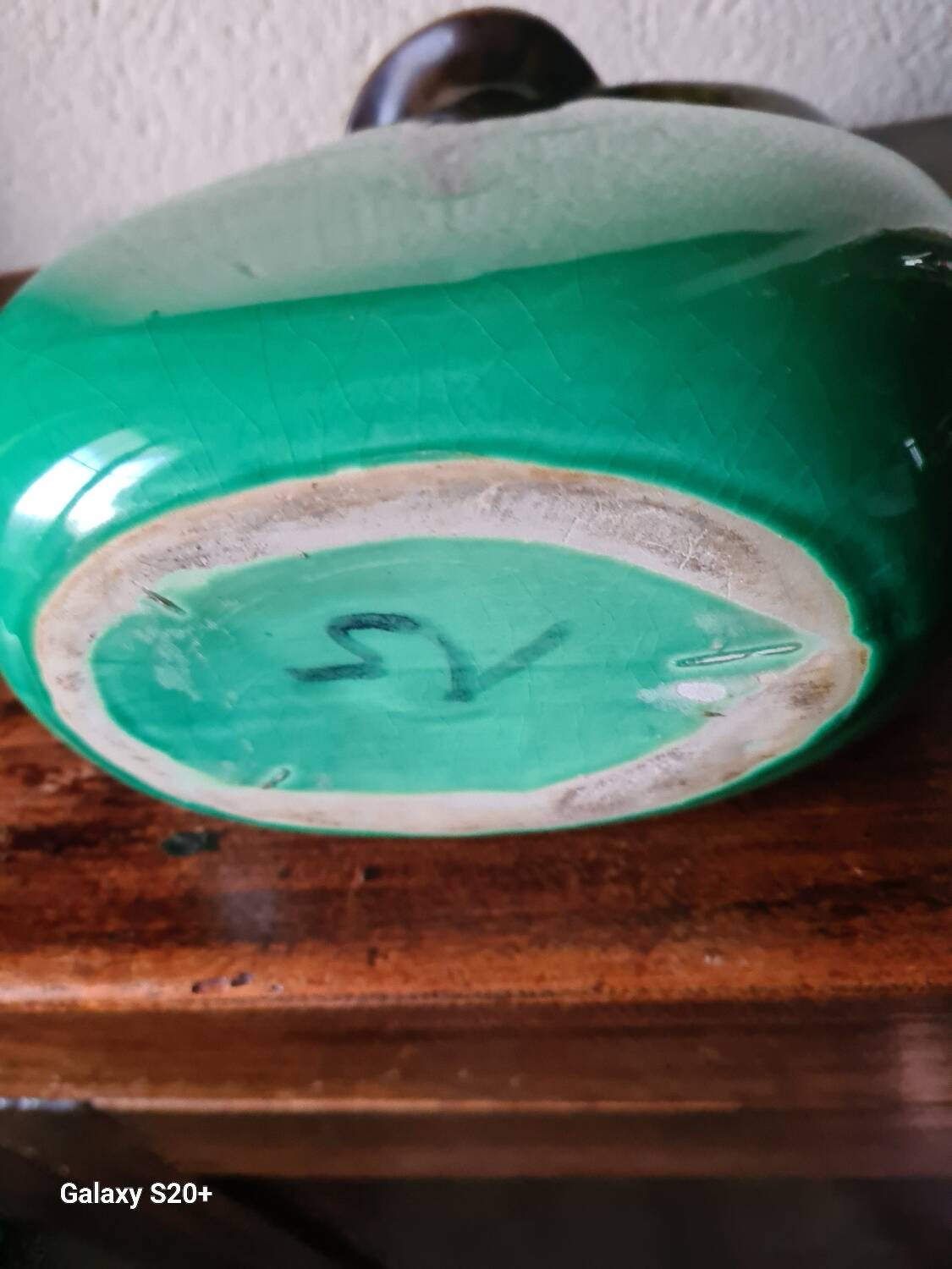 Green and brown ceramic vase