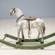 Antique wooden rocking horse, vintage toy with original patina.