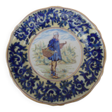 Old earthenware plate decorated with a character marked Le HAVRE