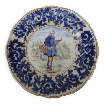 Old earthenware plate decorated with a character marked Le HAVRE