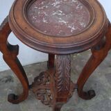 Wooden pedestal table with marble top