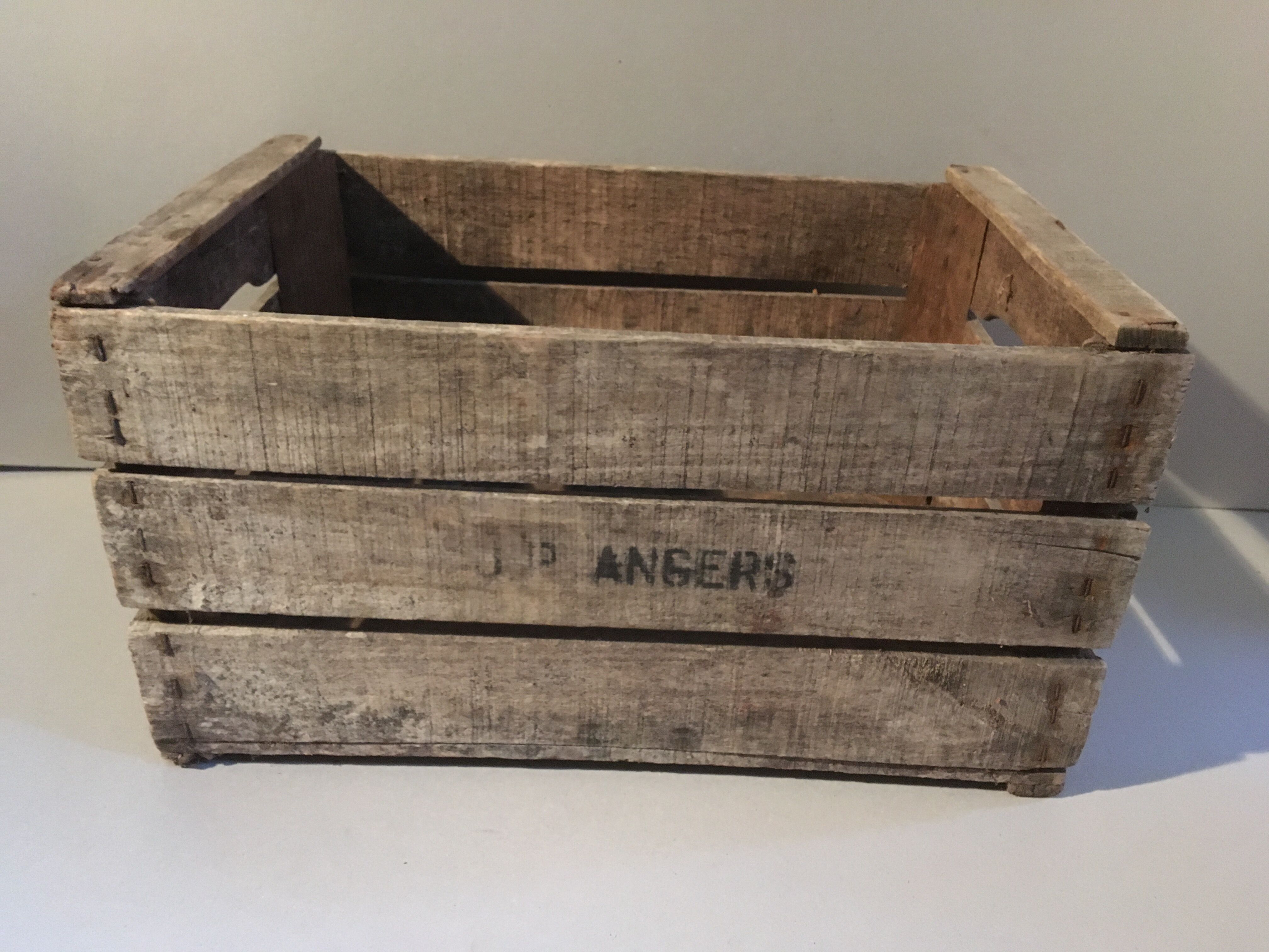 Former wooden apple crate marked JP Angers