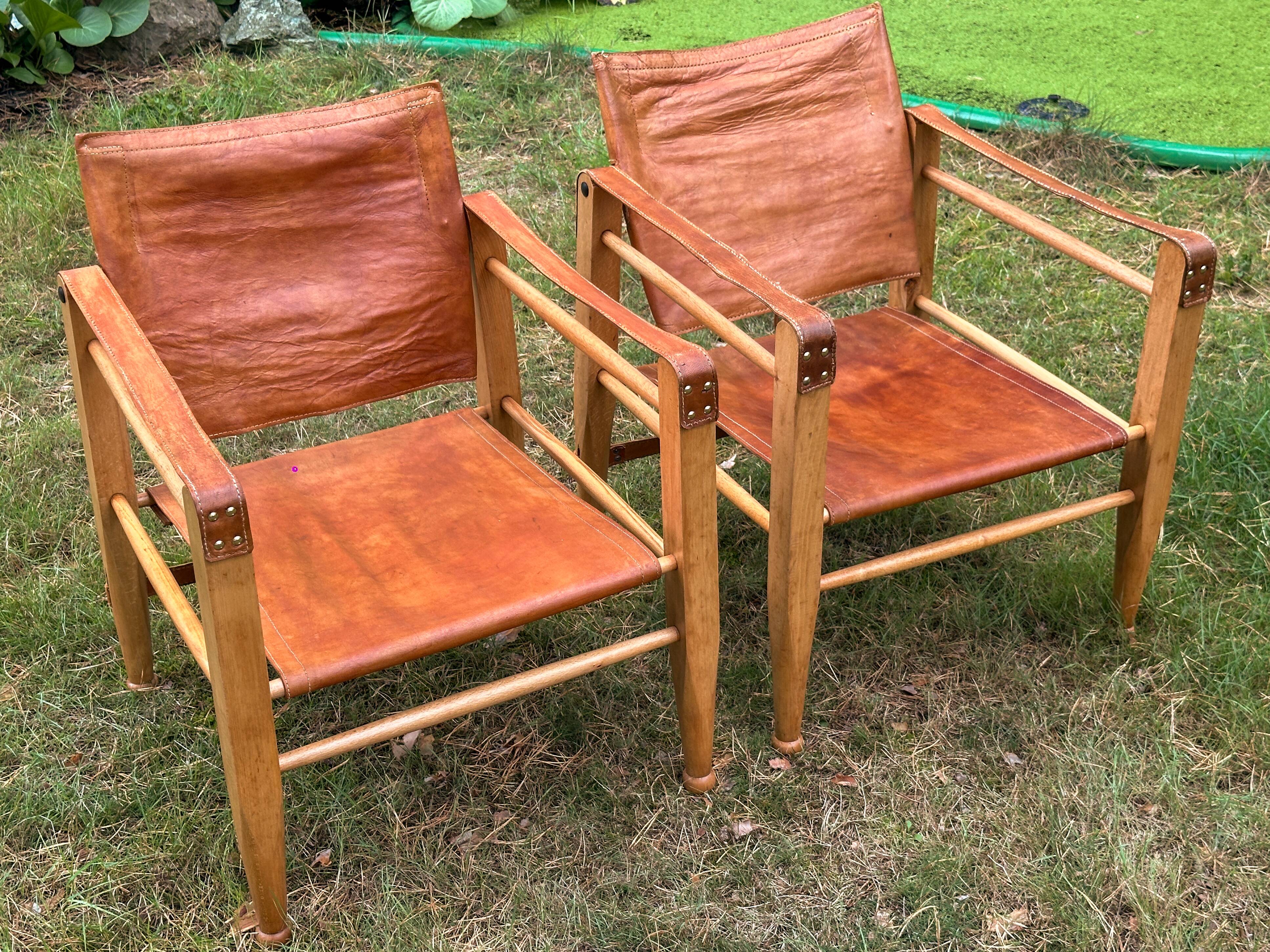 A pair of Danish beechwood and leather Safari armchairs - 1960