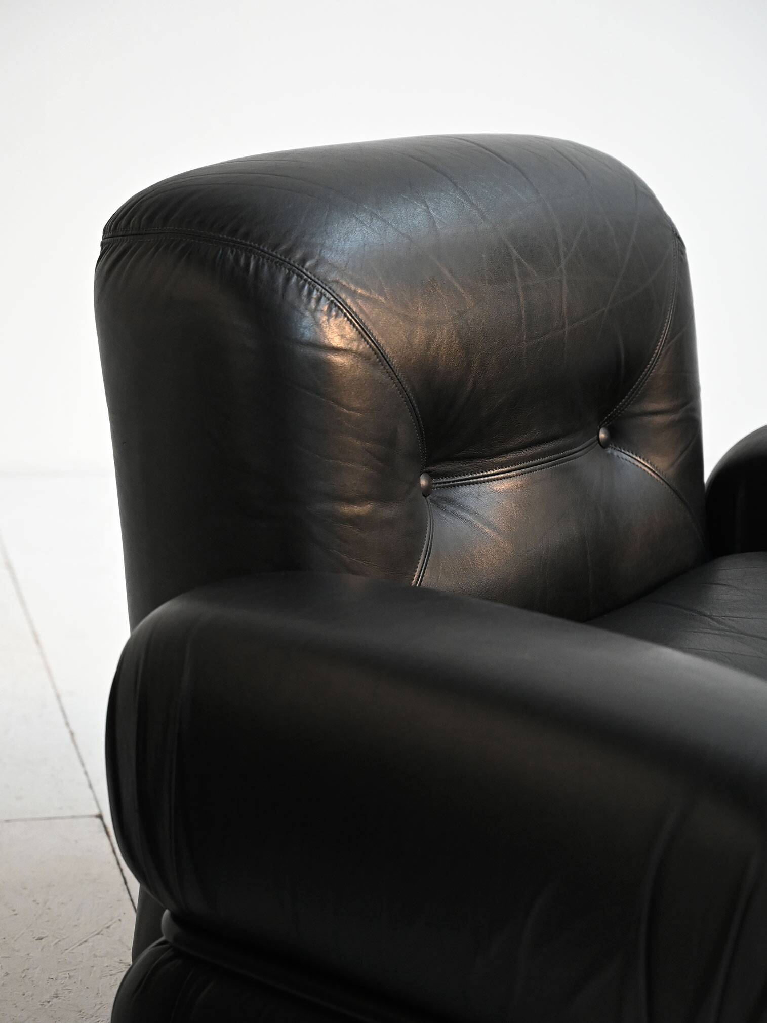Black leather and tubular steel armchairs, 1970s