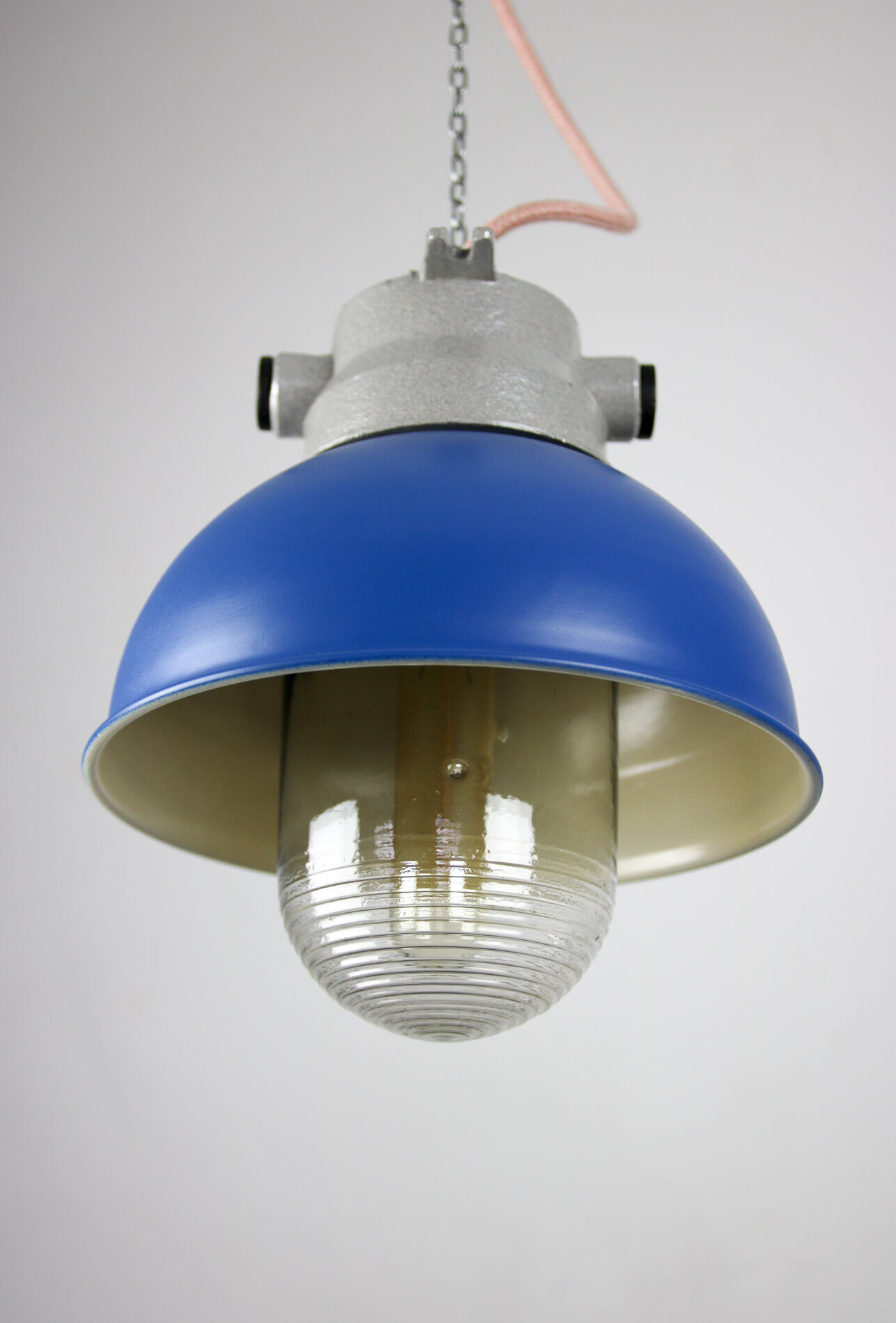 Blue industrial hanging light from tep