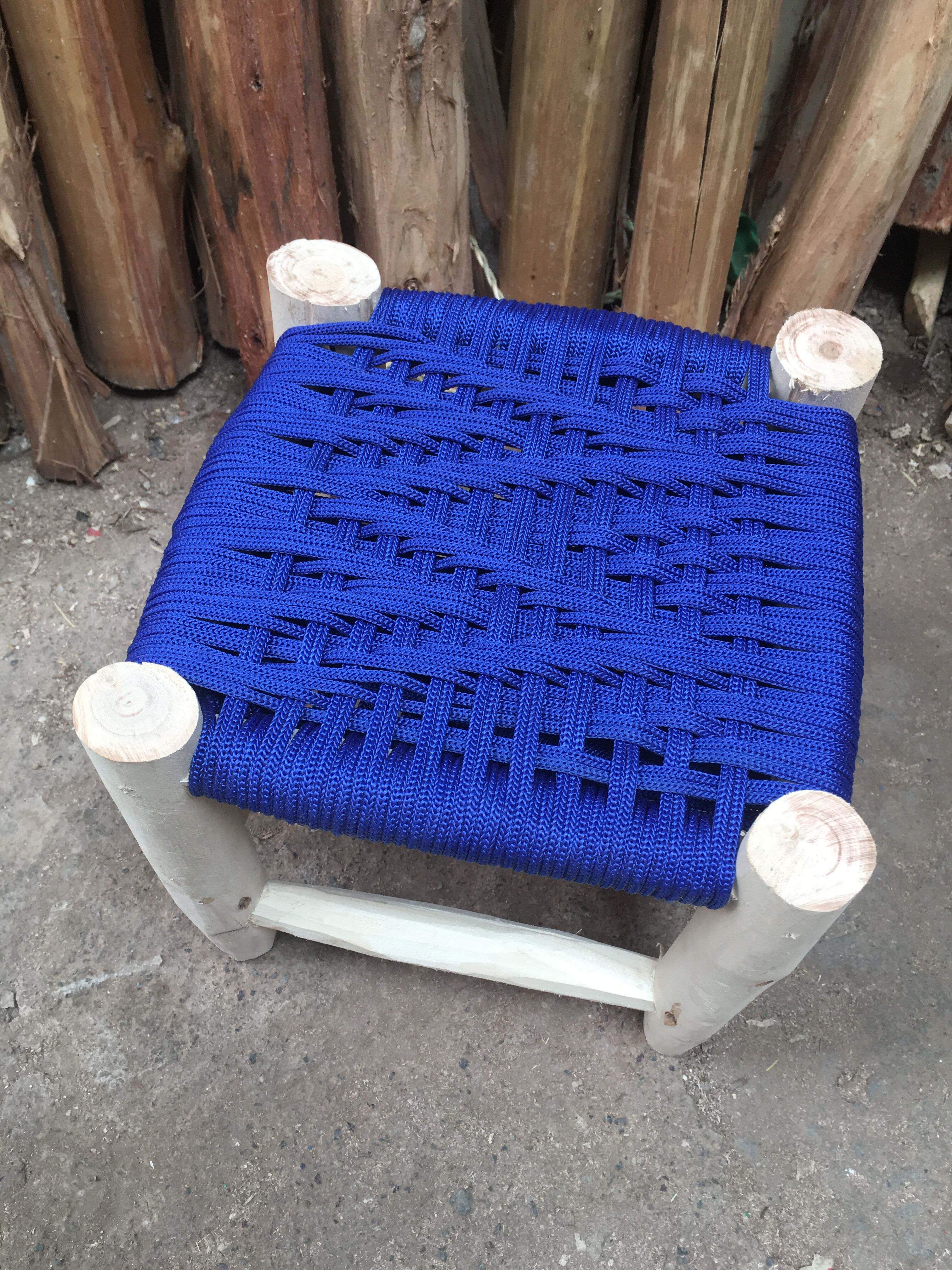 Traditional moroccan stool in blue nylon thread majorelle and eucalyptus wood