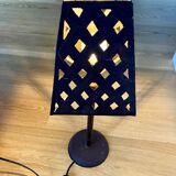 Openwork sheet metal lamp