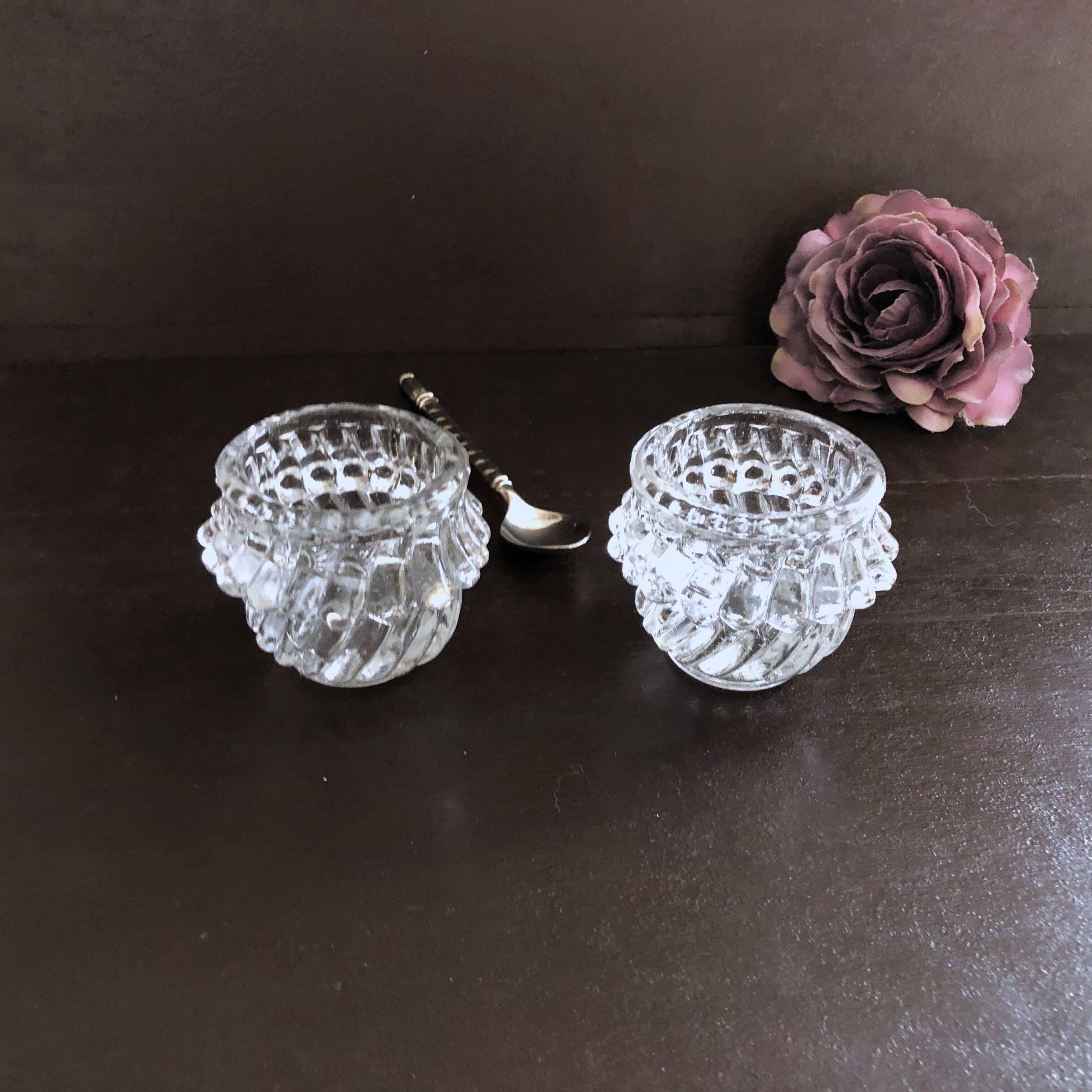 Glass salt and pepper shaker set with vintage serving spoon