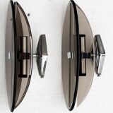Pair of elliptical italian wall lamps in smoked glass and chrome veca