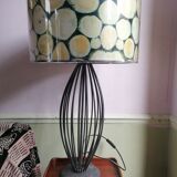 Lamp in wrought iron lampshade tree trunk decoration
