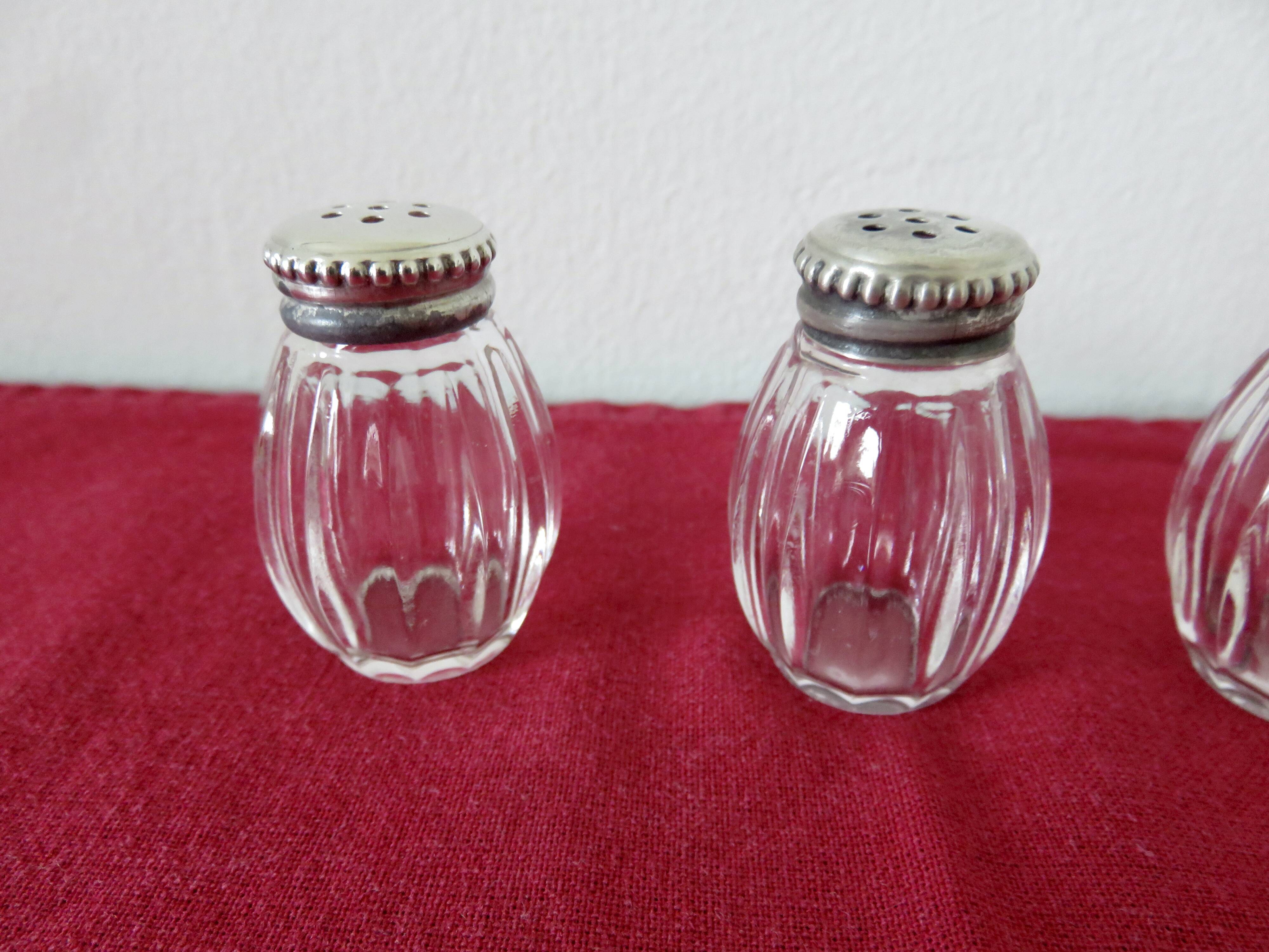 Salt and pepper "CHRISTOFLE" in solid silver in their original box, 1950.