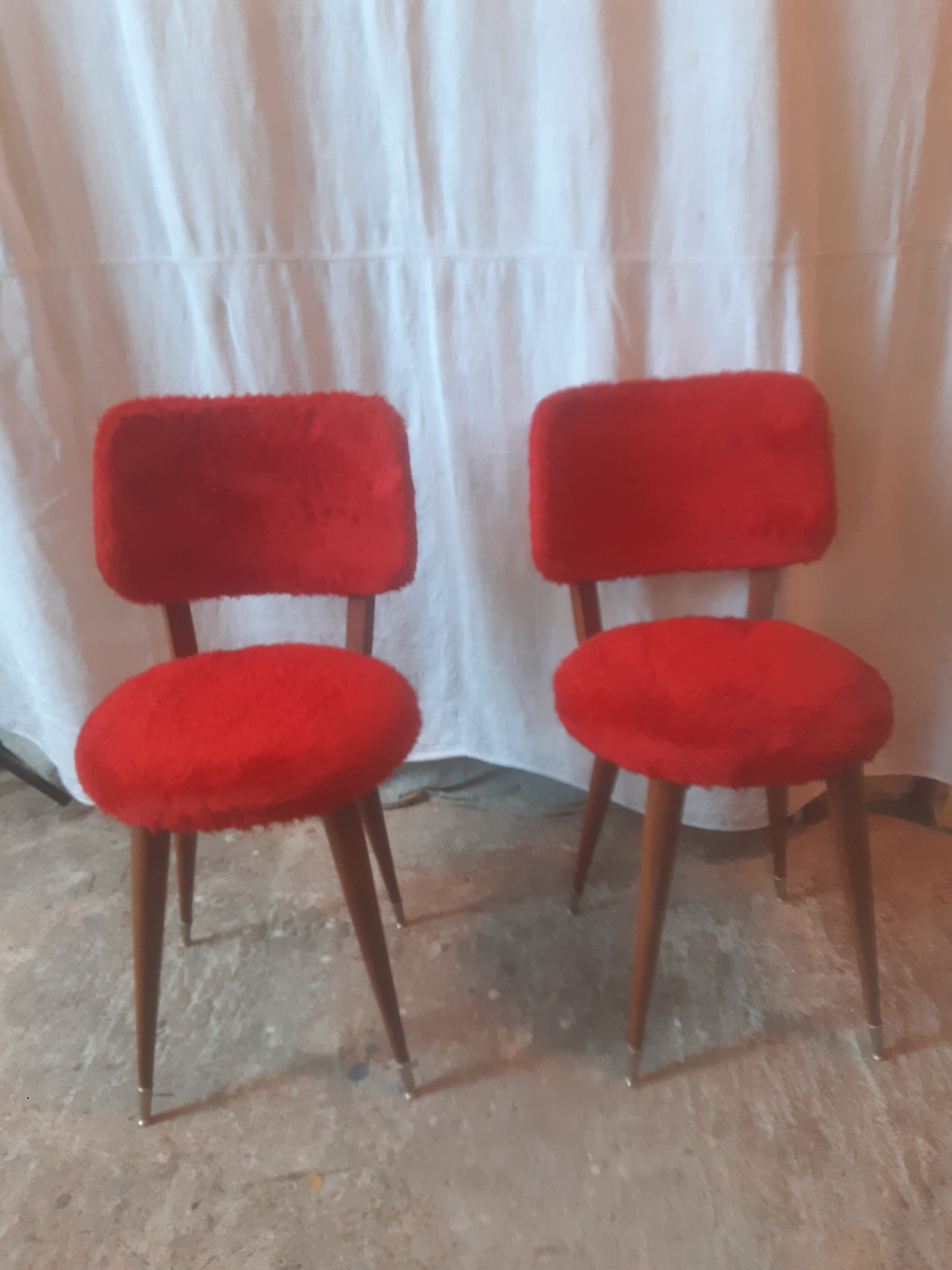 Plush chairs with compass legs
