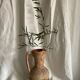 Terracotta jug covered with cork