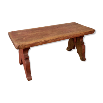 Repose-pied en bois rouge