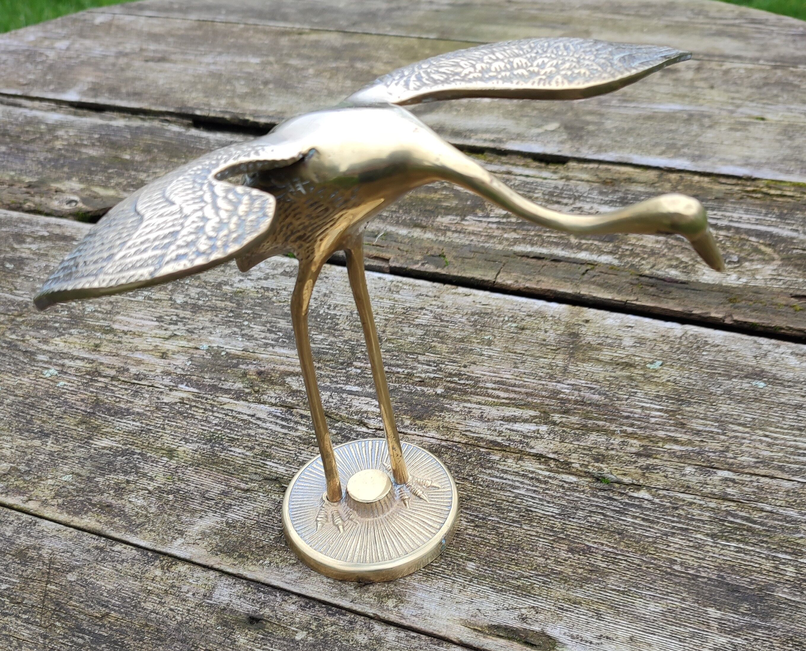 Brass wading bird