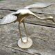 Brass wading bird