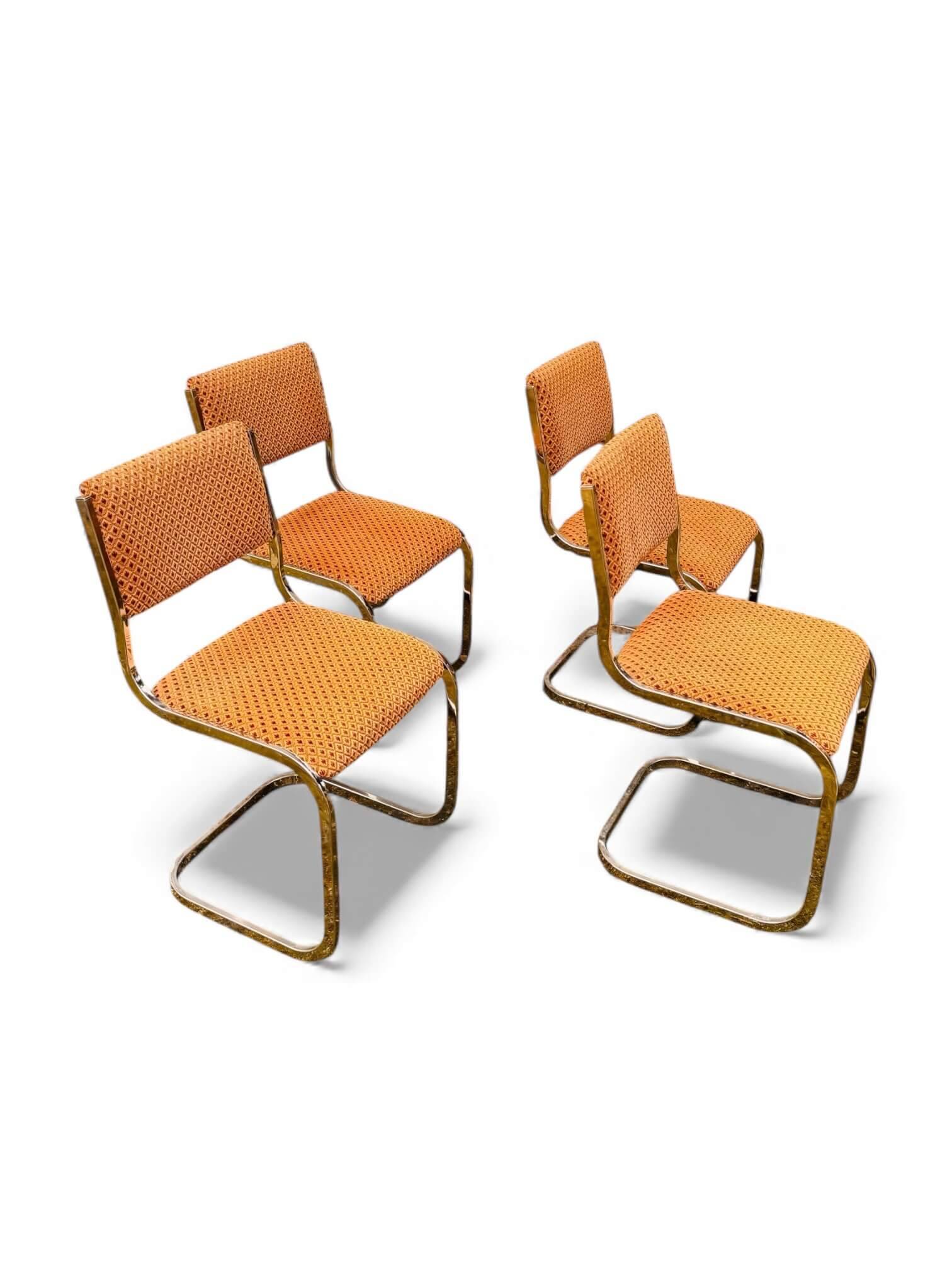Set of 4 vintage sled chairs from the 1970s