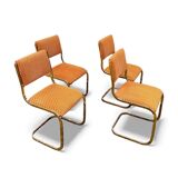 Set of 4 vintage sled chairs from the 1970s