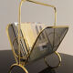 Magazine rack in brass and black lacquered metal, Italy 1970s