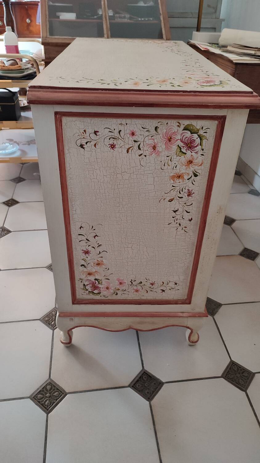 Painted chest of drawers with floral decoration