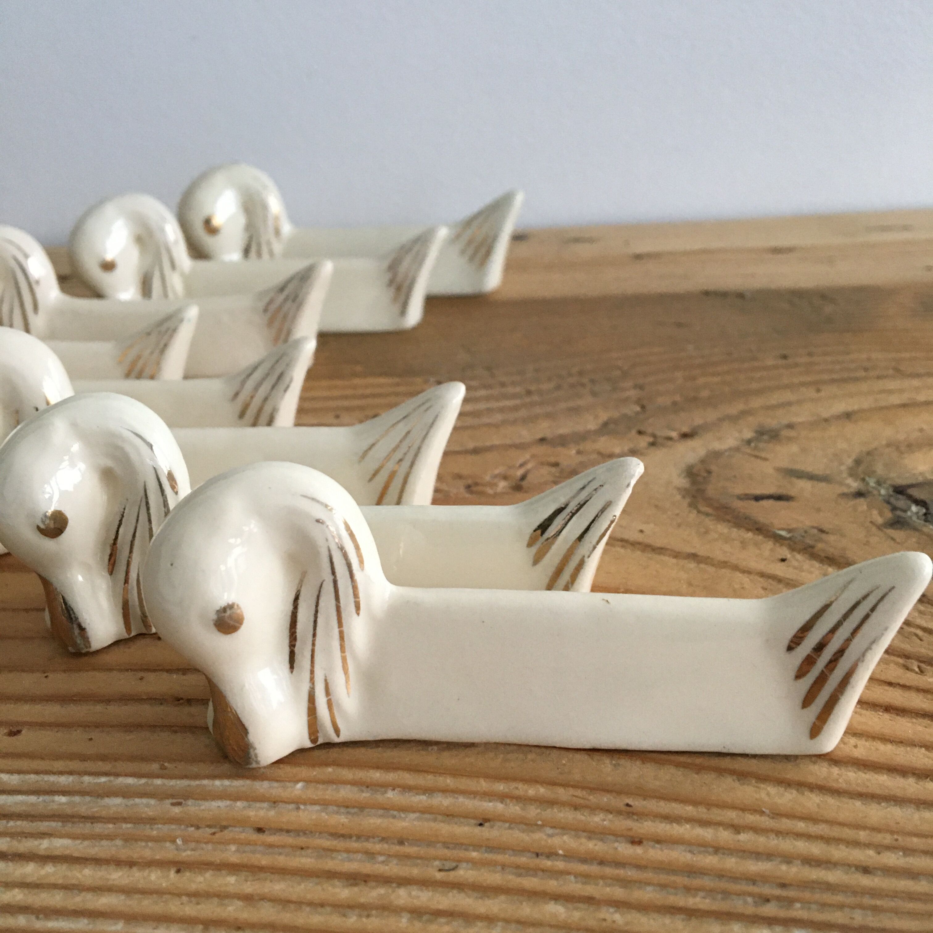 Set of 8 ceramic swan knife holders 50s