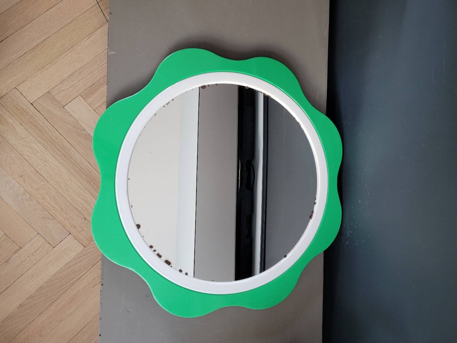 Plastic flower mirror by Finnish designer Makisen Kuvastin