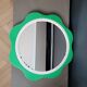Plastic flower mirror by Finnish designer Makisen Kuvastin
