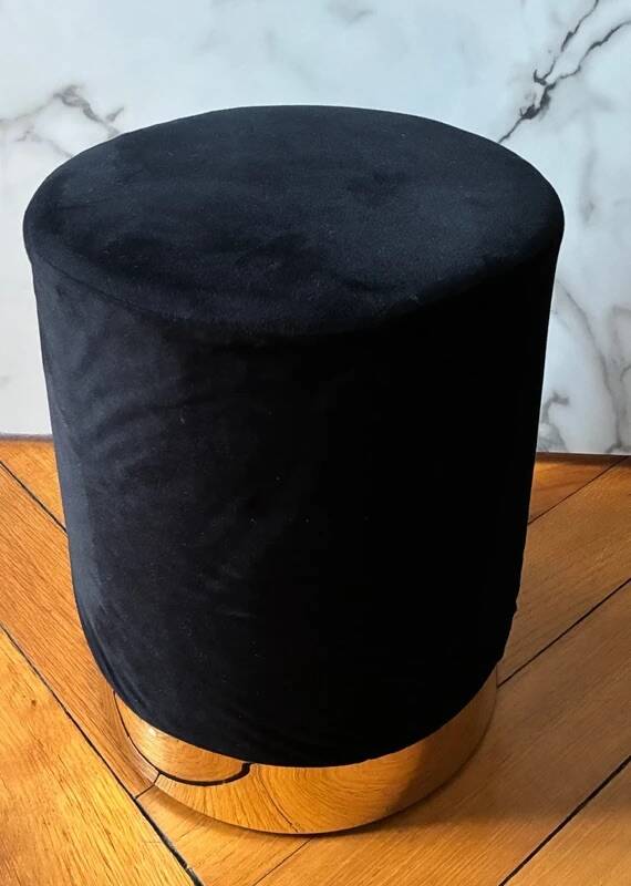 Black velvet cylindrical pouf
