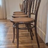 Set of 4 chairs signed Thonet with caning