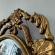 Ancient witch's eye mirror Dollanzo Italy in gilded wood