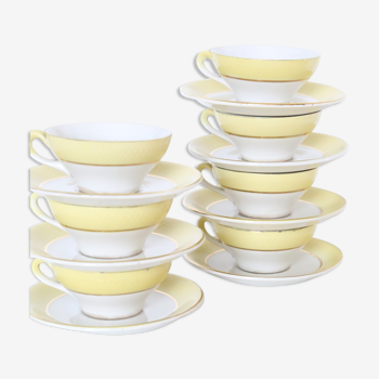 Set of 7 cups and under cups in ceramic Moulin des Loups, yellow, French manufacture,