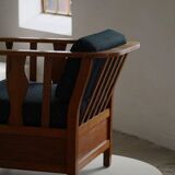 Art Nouveau, pair of oak lounge chairs, reupholstered in style fabric, 1920s.