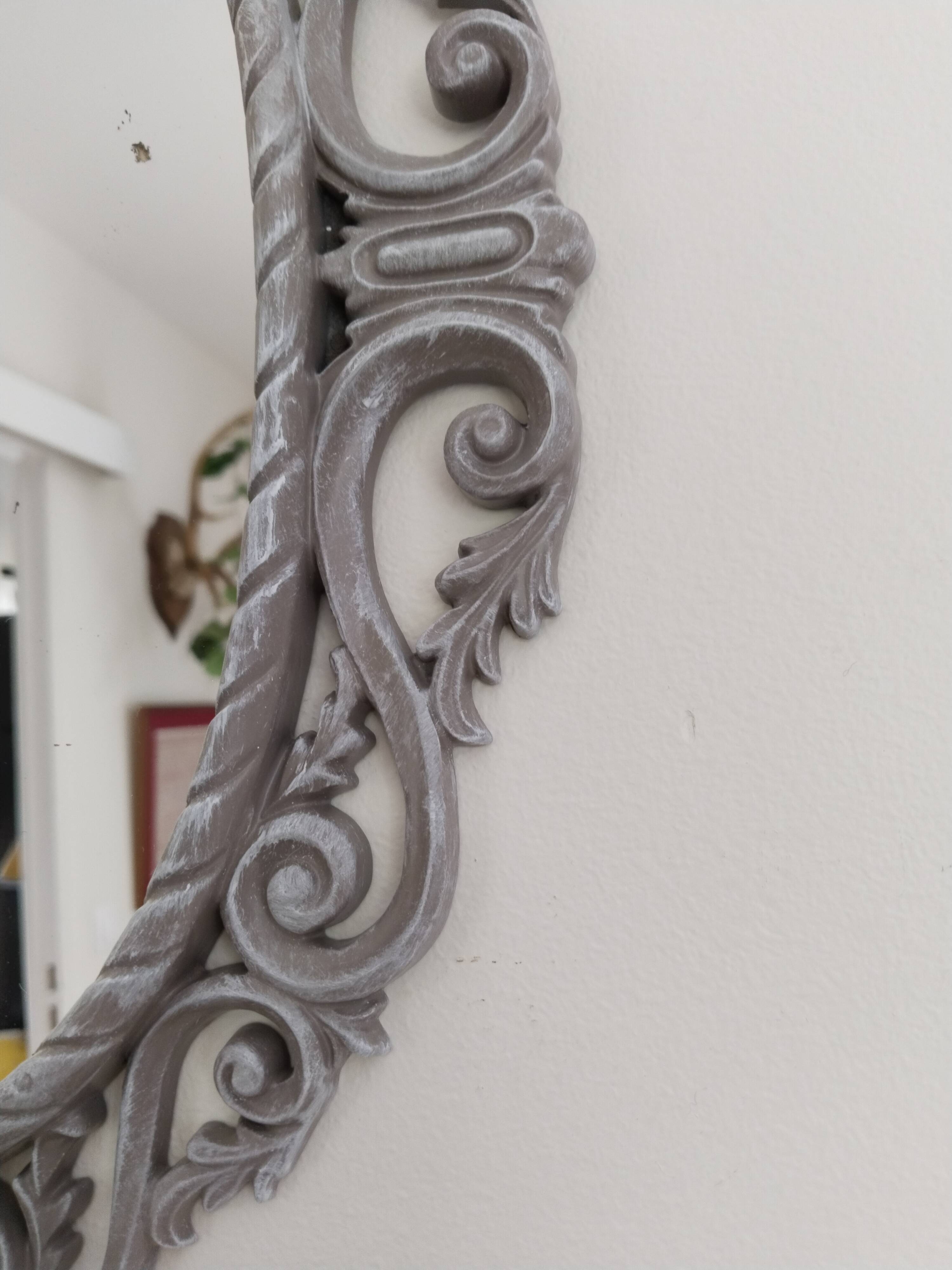 Louis XVI style patinated oval mirror