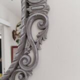 Louis XVI style patinated oval mirror