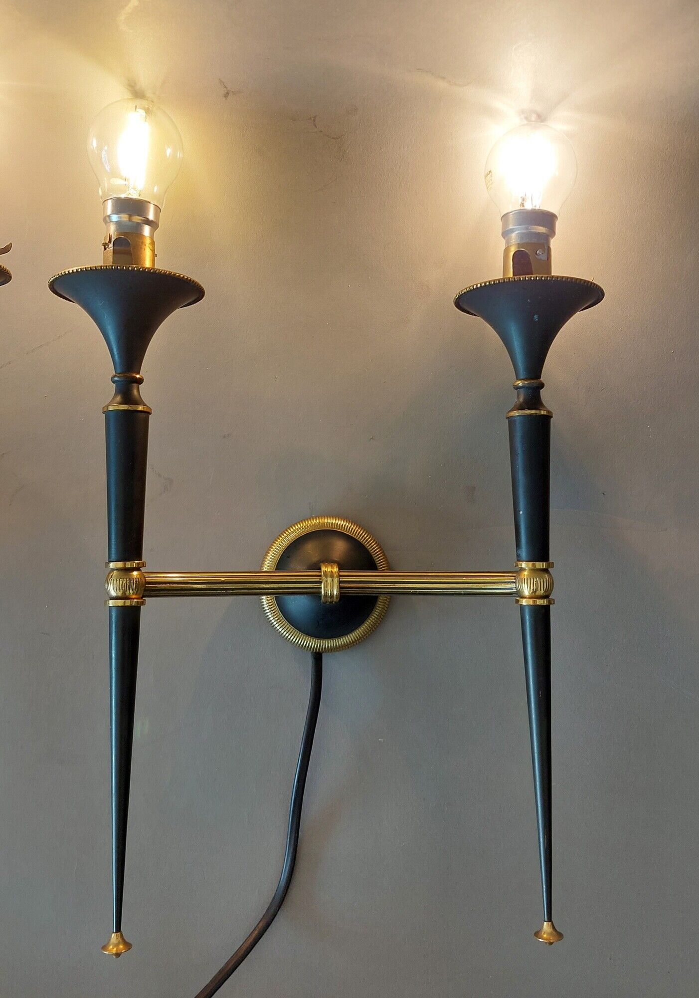 Pair of Maison Arlus torchiere sconces in gold brass and black lacquered 1960