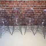 Suite of four plexiglass and metal chairs
