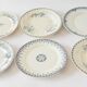 6 mismatched iron earth plates