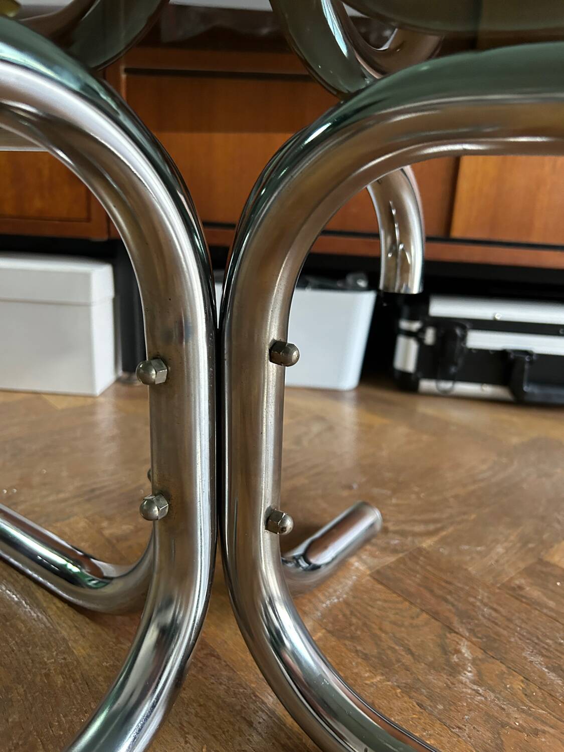 70s design oval coffee table in smoked black glass with chrome legs.