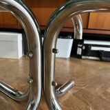 70s design oval coffee table in smoked black glass with chrome legs.