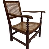 Fauteuil Art Déco en chêne tressé, design minimaliste.