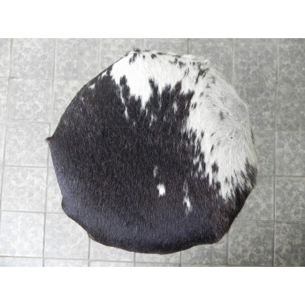 Vintage stool lined with cowhide