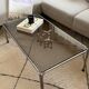 Ancienne table basse chrome et verre fumé vintage