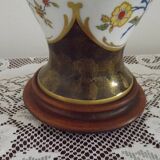 French Limoges Hergé table lamp base with gold highlights and floral decoration.