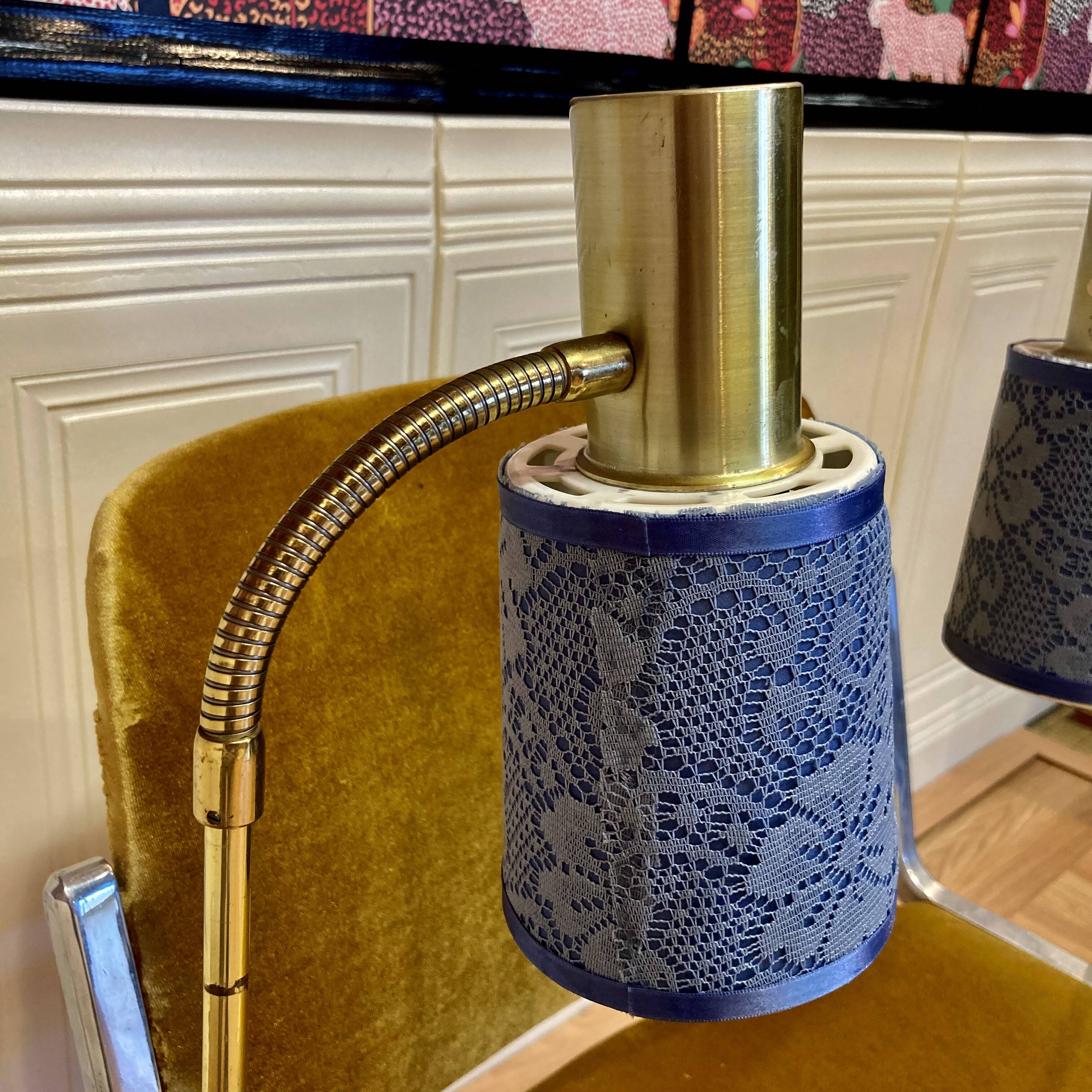 Pair of large modular industrial lamps from the 1950s.