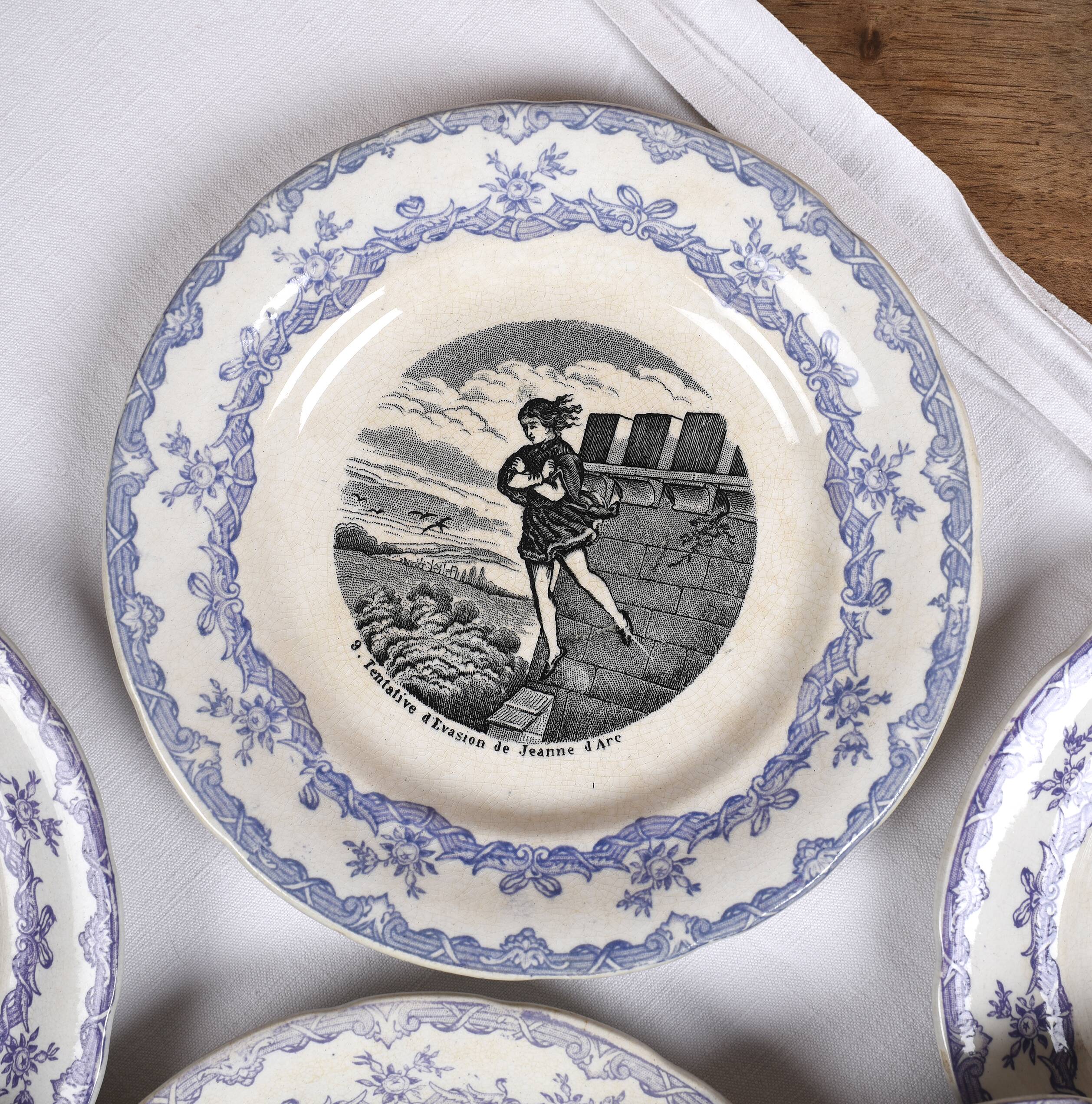 Collection of talking plates with Joan of Arc theme, in earthenware from the Choisy le Roi factory