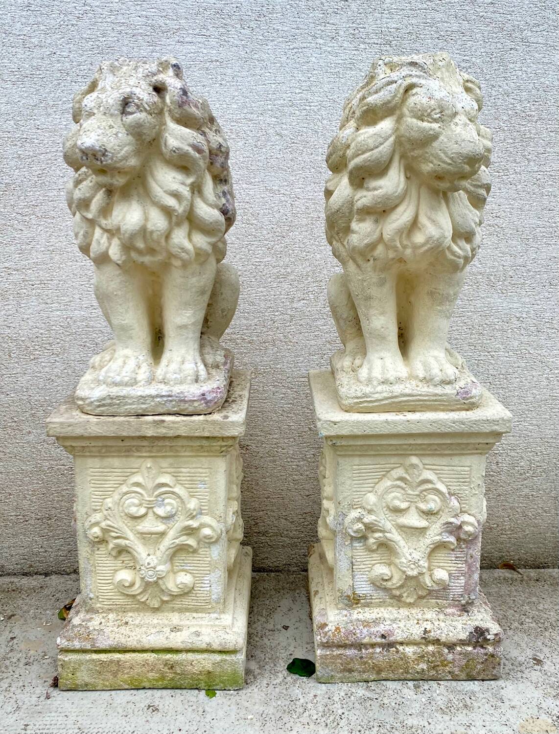 Pair of lion garden statues