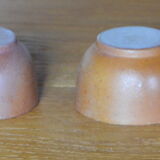 Lot of 4 bowls in sandstone and shiny grey inside