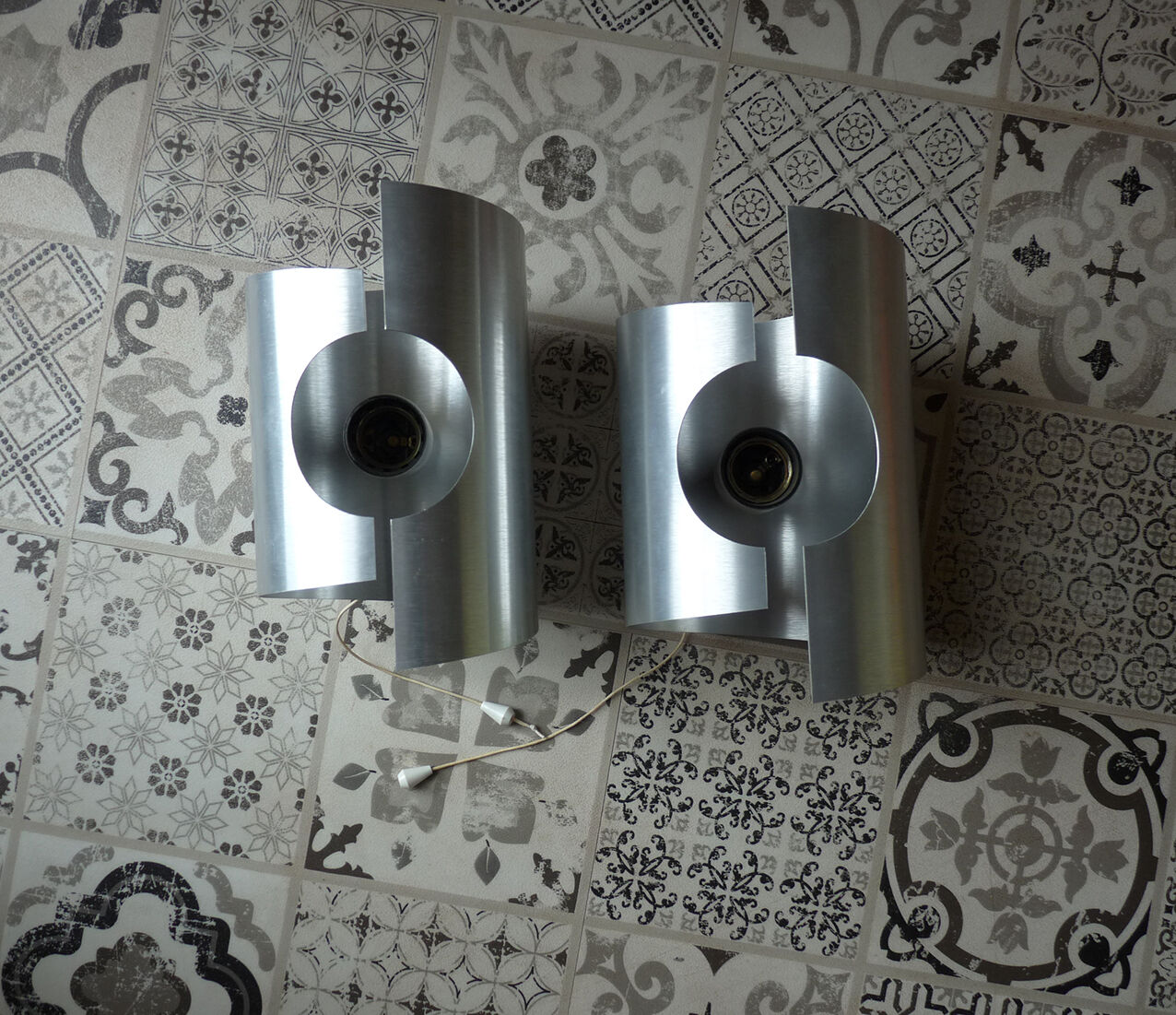 Pair of "roll" or ufo vintage brushed metal wall / 1960